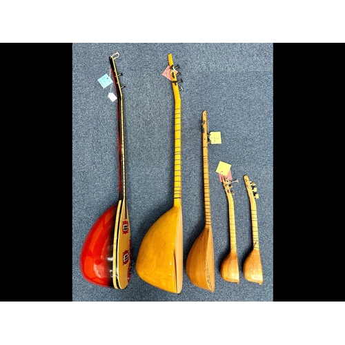 1110 - Collection of Five Saz, various sizes, Turkish, largest approx. 44'' long.