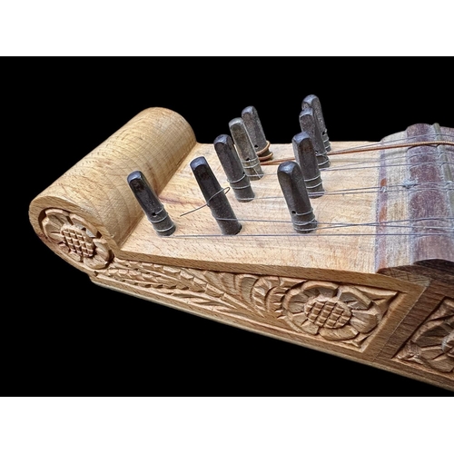 1112 - Hand Carved Decorative Zither, 17 string, length 32.5''.