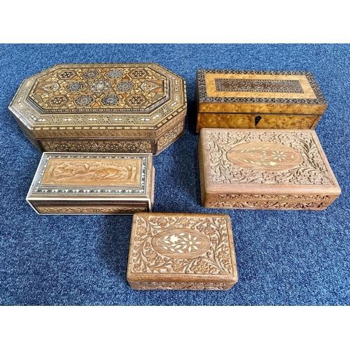 1186 - Five Wooden Boxes, profusely carved, assorted sizes, largest 15'' x 9''.