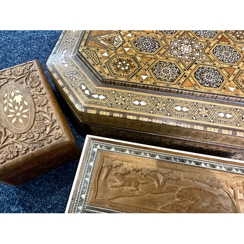 1186 - Five Wooden Boxes, profusely carved, assorted sizes, largest 15'' x 9''.