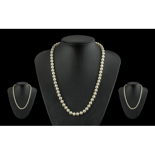 124 - A Good Quality Single Strand Cultured Pearl Necklace, well matched with good lustre. the 9ct gold cl... 