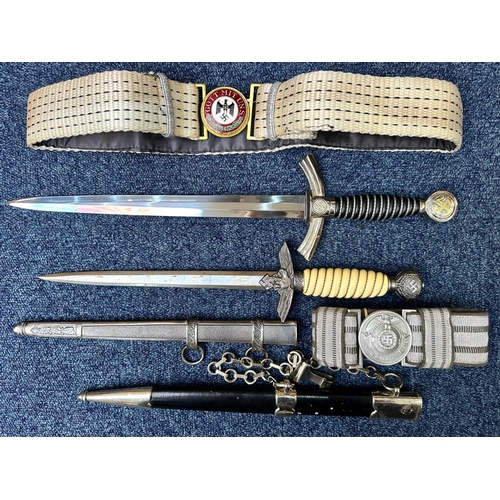 1336 - Two Copy German Daggers, Luftwaffe First & Second Pattern, together with two copy belt and buckles, ... 