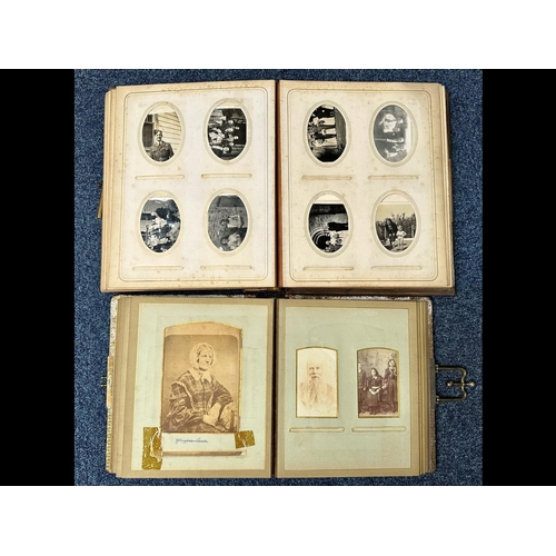 1355 - Two Carte-de-Visite Albums, leather cased, comprising family photographs, including wartime, Victori... 