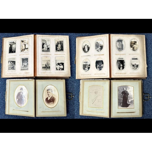 1355 - Two Carte-de-Visite Albums, leather cased, comprising family photographs, including wartime, Victori... 