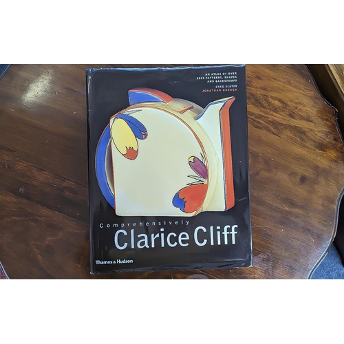 1360 - 'Comprehensively Clarice Cliff' hardcover book by Greg Slater, published in 2005.  At atlas of over ... 