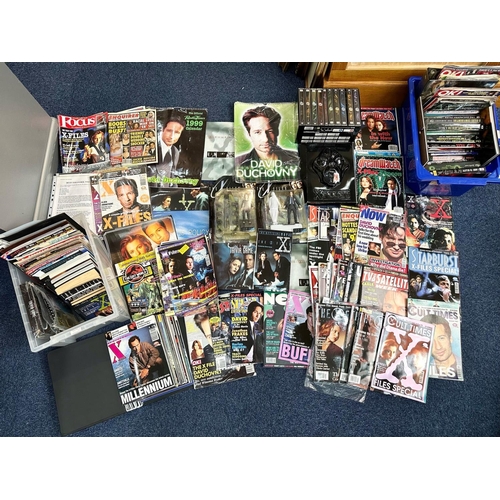 1434 - Four Boxes of X Files Memorabilia, including blister packs, DVDs, magazines, authentic film original... 