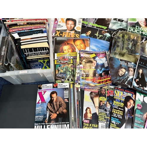 1434 - Four Boxes of X Files Memorabilia, including blister packs, DVDs, magazines, authentic film original... 