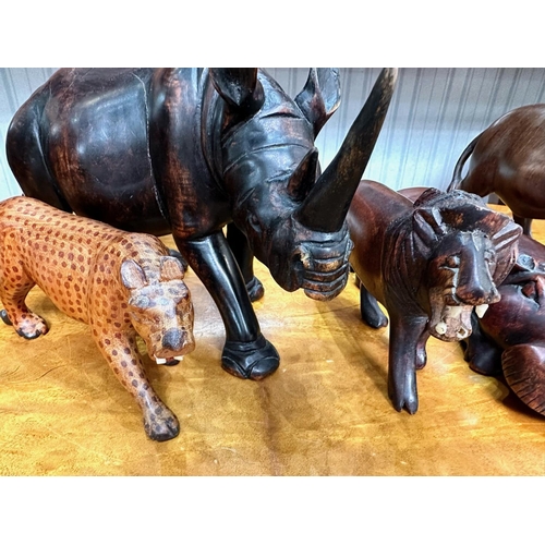 1495 - A Collection of Wooden Wildlife Animal Figures (5) in total. To include elephant, rhino, cheetah, hi... 