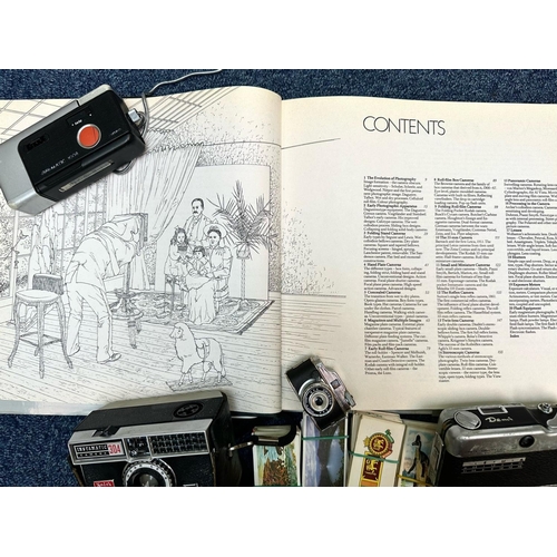 1605 - A Collection of Cameras and Cigarette Cards cameras to include Brownie, Kodak, Canon, Polaroid insta... 