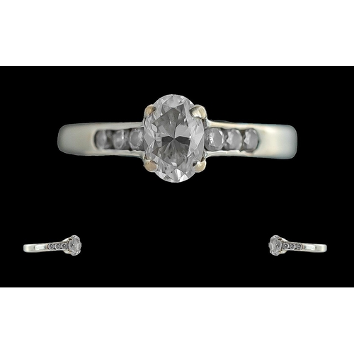 35A - Ladies 18ct White Gold Diamond Set Dress Ring - Of Excellent Proportions. The Central Oval Shaped Fa... 