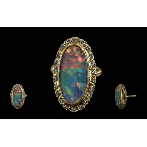 4 - Ladies - Excellent 18ct Gold Diamond and Opal Set Ring, marked 18ct. the large elongated oval opal o... 