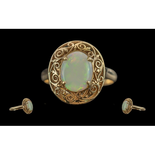 45 - Antique period 18ct gold single stone opal set ring, with open worked ornate mount / shank, marked 1... 