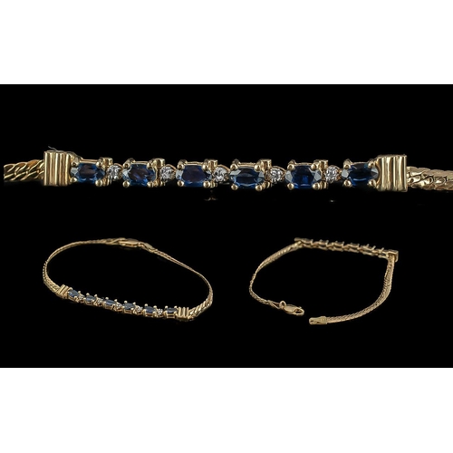 52 - Ladies Pleasing 14ct Gold Blue Sapphire and Diamond Set Elegant Bracelet Marked 585 14ct. The Blue F... 