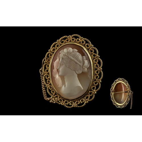 57A - Ladies - Pleasing Quality 9ct Gold Open-worked Mounted Shell Cameo with Safety Chain, with full hall... 