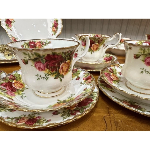 587 - Royal Albert 'Old Country Roses' Tea Set, comprising eight teacups, seven saucers, nine side plates,... 