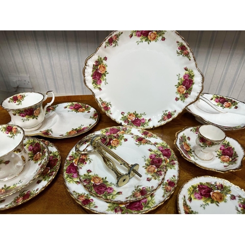 587 - Royal Albert 'Old Country Roses' Tea Set, comprising eight teacups, seven saucers, nine side plates,... 