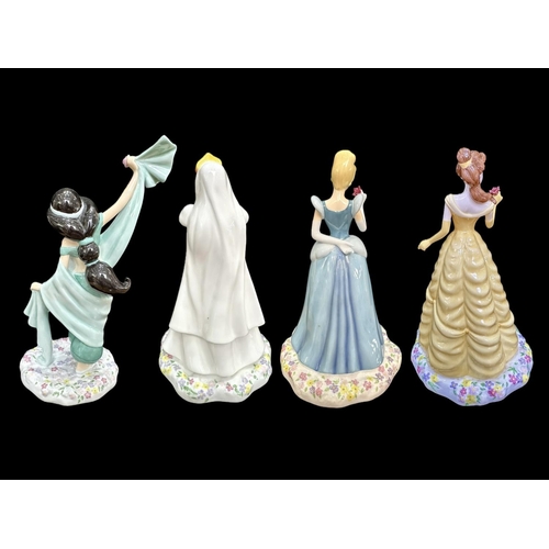 611 - Four Royal Doulton Disney Showcase Princesses, all in original boxes as new, comprising Ariel, Belle... 