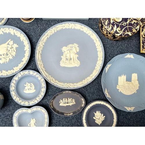 645 - Collection of Wedgwood, including 'Blue Jasper' ware bowl, vase, pair of candlesticks, mantle clock,... 