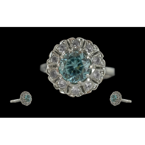 66 - Ladies attractive 9ct white gold aquamarine and diamond set cluster ring, marked 9ct to shank. the c... 