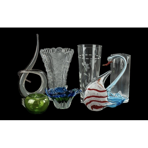 781 - Collection of Decorative Glass Ware, including a 20'' tall black and clear glass vase, 15'' twisted ... 