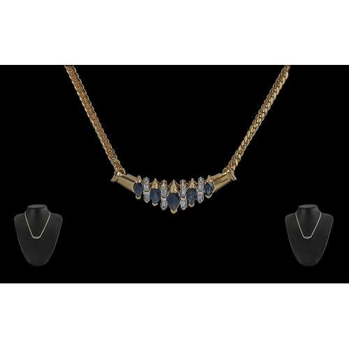 80 - Ladies 14ct Gold Pleasing Design Sapphire & Diamond Set Necklace, marked 14ct.  The boat shaped blue... 