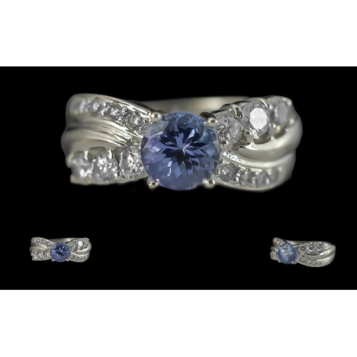 93 - Ladies 14ct White Gold Tanzanite and Diamond Set Dress Ring. Marked 14ct to Interior of Shank. The C... 