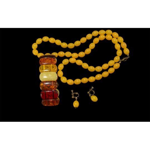 437A - Set of Butterscotch Amber Style Coloured Beads, together with a matching pair of earrings and an exp... 