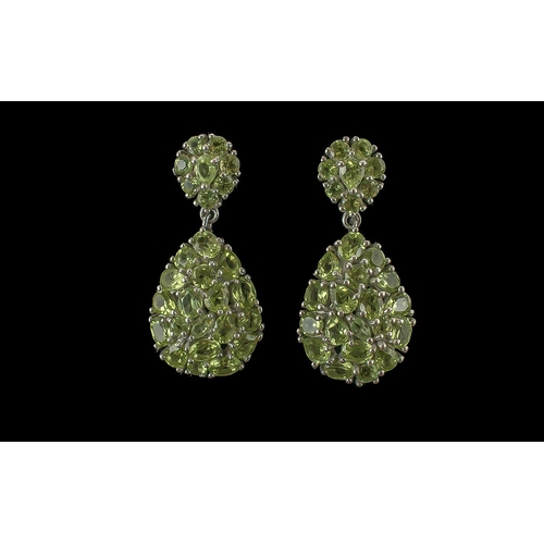 143 - Large Peridot Teardrop Cluster Earrings. 7.5cts of bright, sparkling peridots set in large teardrops... 