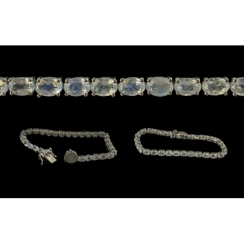 144 - Moonstone Tennis Bracelet, the oval cut moonstones, totalling 14cts, beautifully faceted to bring ou... 