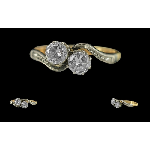 25 - Ladies 1920's Attractive 18ct Gold Two Stone Diamond Set Ring. Marked 18ct to Interior of Shank. The... 