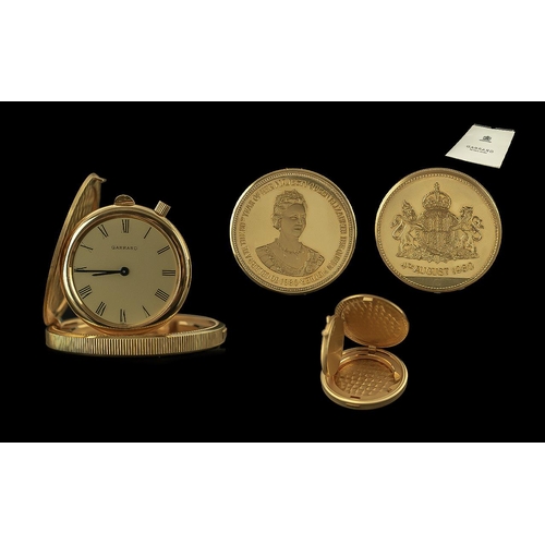 6 - 18 CARAT GOLD GARRARD & CO LIMITED EDITION COMMEMORATIVE COIN WATCH A gold commemorative coin watch,... 