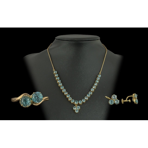 69A - Antique Set Of Gold Jewellery To Include A Necklace Earrings And Ring, All Set With Matching Blue Zi... 