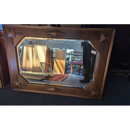 1061 - Two Large Mirrors, comprising an antique oak bevelled mirror measures 26'' x 35'', together with a p... 