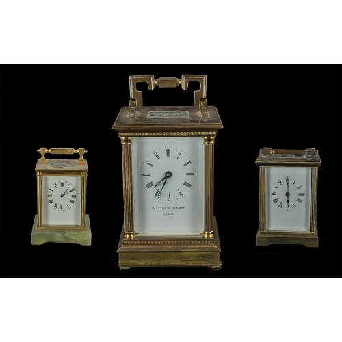 1101 - Three Brass Carriage Clocks, all of typical form, one of onyx base marked KJB.  Tallest 6'' includin... 