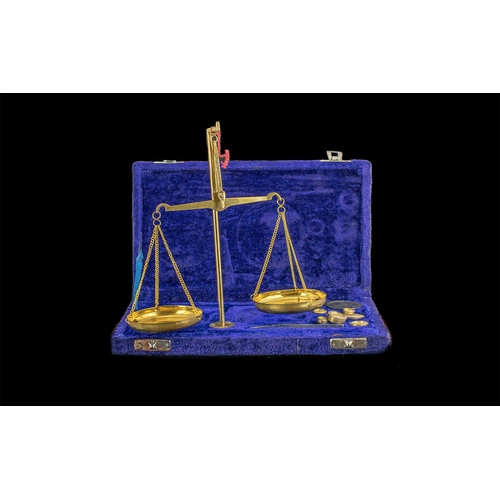 1166 - Boxed Set of Brass Scientific Scales, with weights. in fitted blue velvet case.