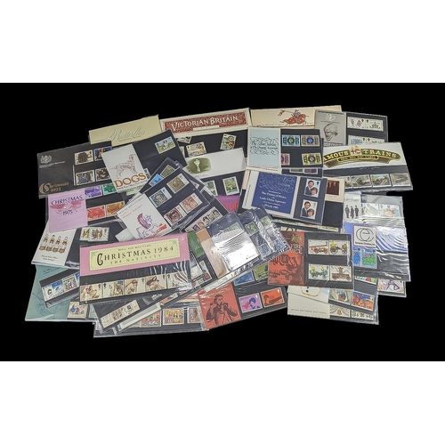 1447 - Stamp Interest - Around 100 Stamp Presentation Packs Containing Mint Unmounted Stamps Mostly From Th... 