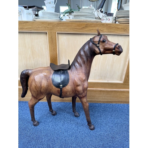 1477 - Large Leather Coated Horse, with glass eyes, saddle, etc.  Original condition.  Measures 27'' high.