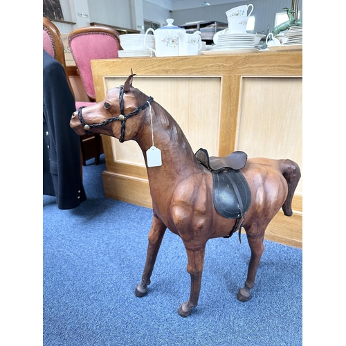 1477 - Large Leather Coated Horse, with glass eyes, saddle, etc.  Original condition.  Measures 27'' high.