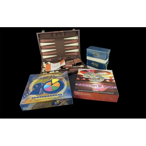 1497 - Collection of Boxed Games, including a Backgammon Set in a leather carry case, Trivial Pursuit with ... 