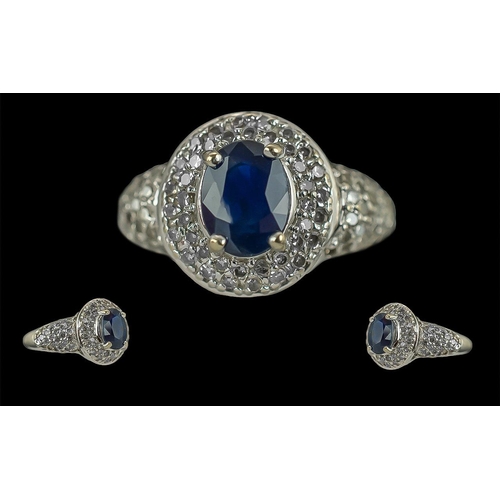 222 - Ladies Pleasing 10ct White Gold Diamond and Sapphire Set Dress Ring, Marked 10ct to Shank. Est 0.50 ... 