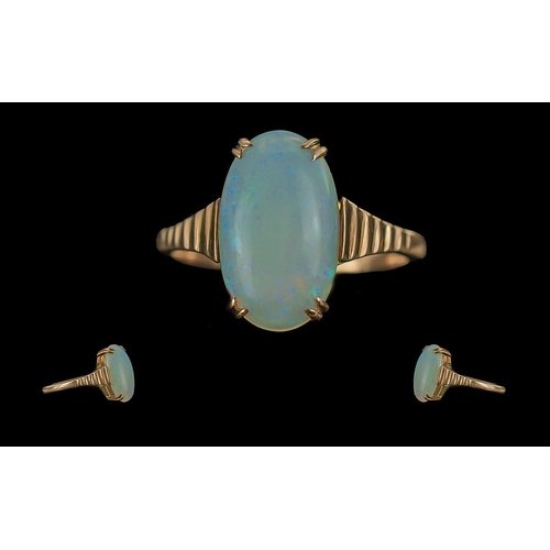 294 - Ladies - Attractive 9ct Gold Single Stone Opal Set Ring, Marked to Shank. Ribbed Setting. The Large ... 