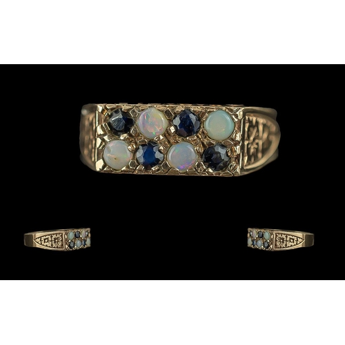 300 - Ladies 9ct Gold Pleasing Sapphire and Opal Set Ring with raised, open worked setting, full hallmark ... 