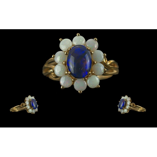 303 - Ladies 9ct Gold Pleasing Quality Triple Blue Opal and Pale Opal Set Cluster Ring, The Central Blue T... 