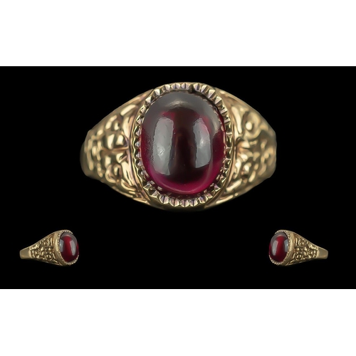 311 - Ladies - Ornate 9ct Gold Single Stone Fire Garnet Set Ring, Marked 9.375 to Shank. The Cabochon Cut ... 