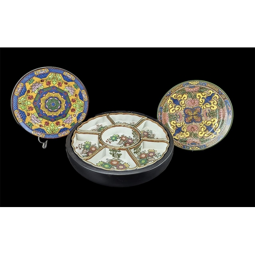 585 - Continental 'Lazy Susan', central circular bowl surrounded by six serving segments, floral design on... 