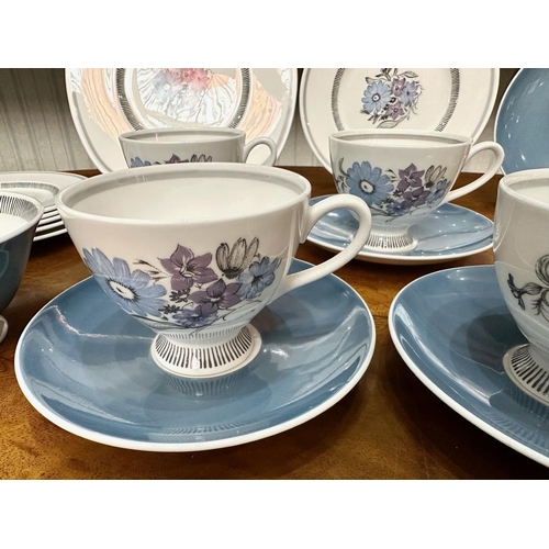 586 - Susie Cooper Bone China Tea Set, comprising five cups, six saucers, six side plates, a bread and but... 