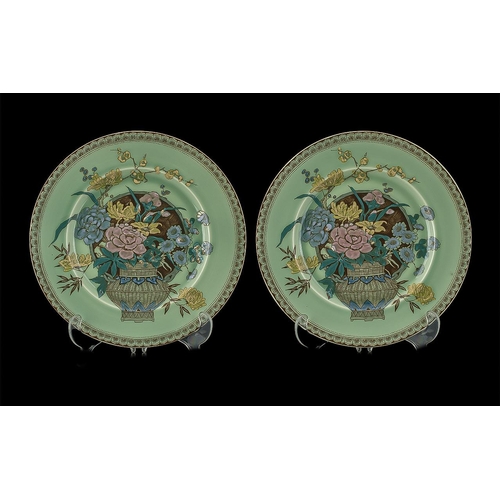 646 - Pair of Clarice Cliff 'Ophelia' Newport Cabinet Plates, green background with a basket of flower dec... 