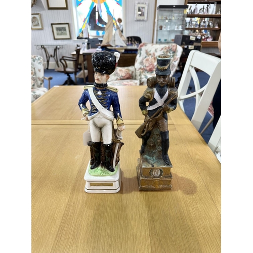 673 - Two Pottery Military Figures, one a decanter of Prince Albert's Own Hussars 13.5'' high, and the oth... 