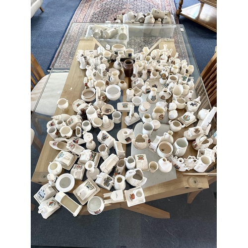 678 - Large  Collection of Crested Ware, including pots, houses, jugs, etc... Approx 150 pieces.