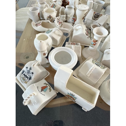 678 - Large  Collection of Crested Ware, including pots, houses, jugs, etc... Approx 150 pieces.